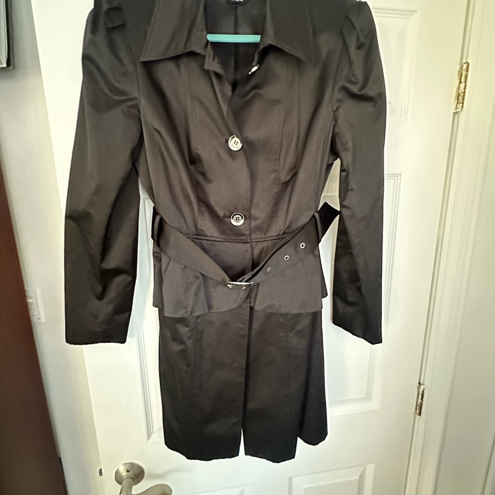 Bebe peplum trench coat. Size large, worn only once. In almost per condition.